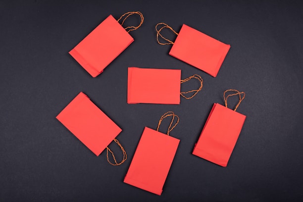 orange paper clip on black surface