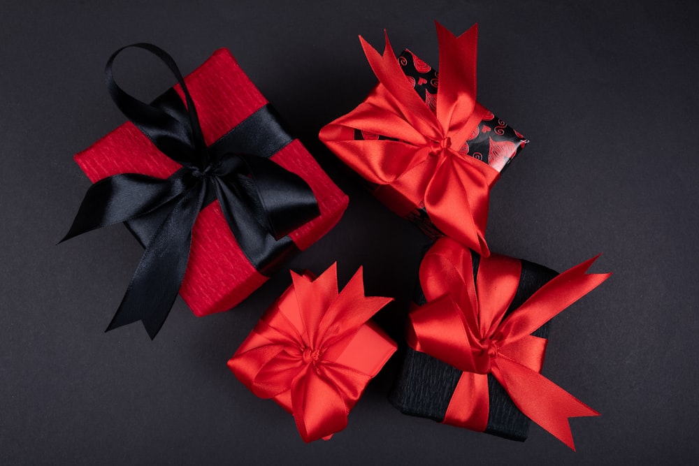 red ribbon on black textile