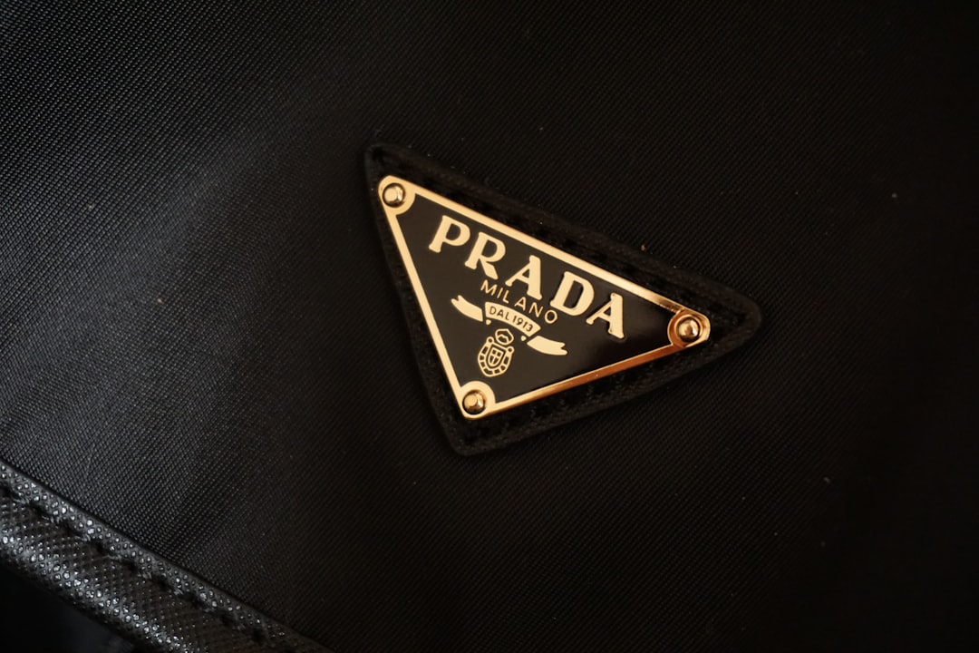 a prada logo on a black jacket,