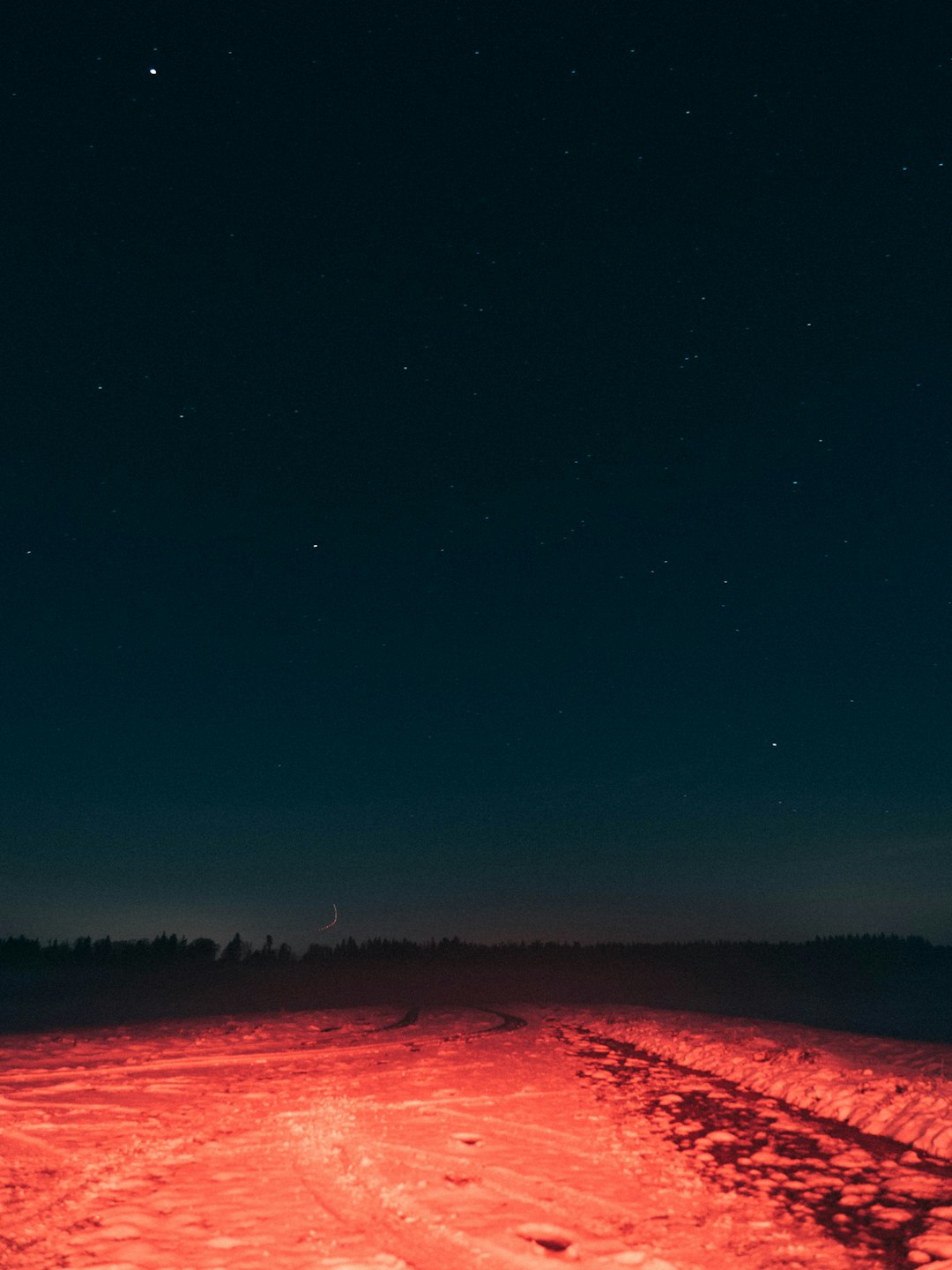 silhouette of mountain during night time