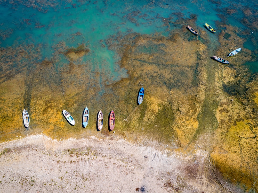 aerial view of boats on shore during daytime