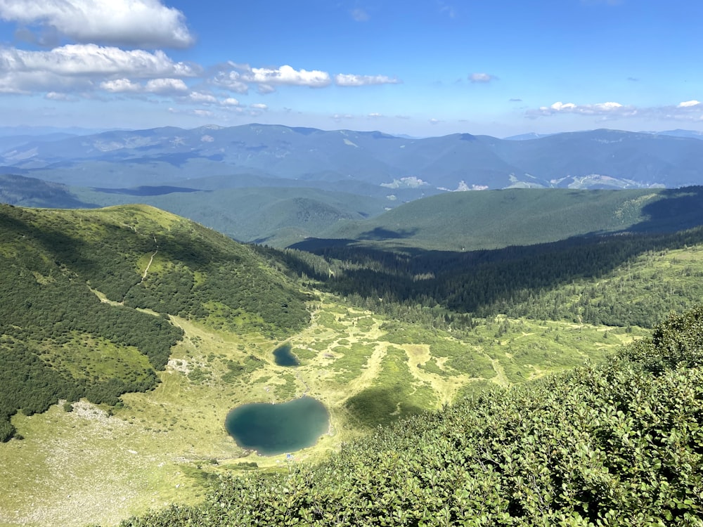 green mountains under blue sky during daytime