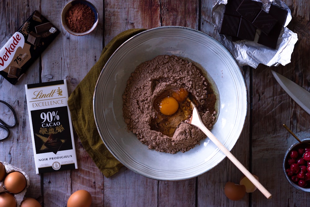 brown food on white ceramic bowl