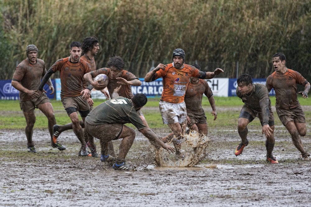 men running on dirt road during daytime