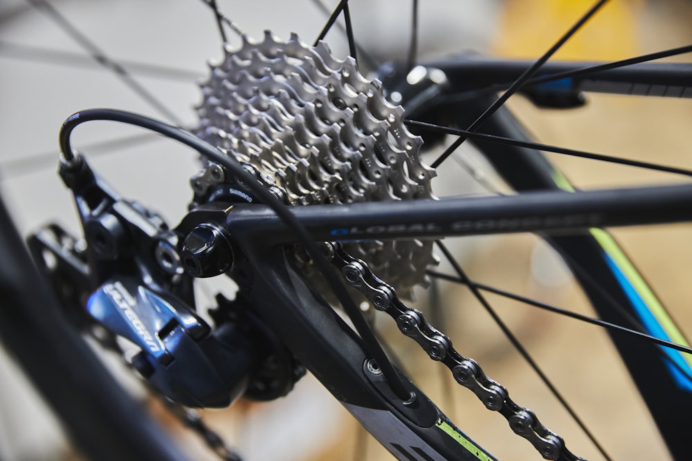 black bicycle wheel in close up photography