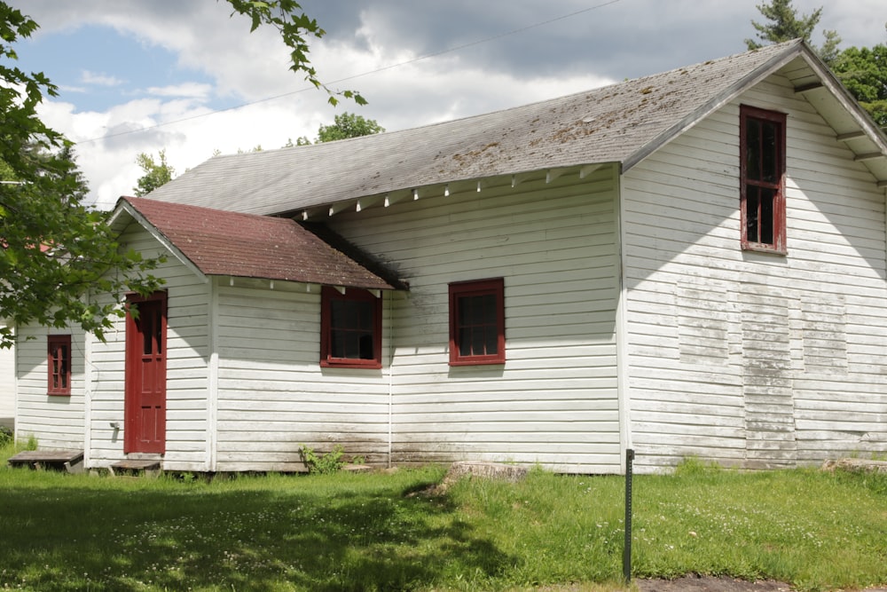 white and red wooden house