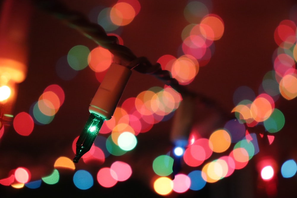 bokeh photography of red and white lights
