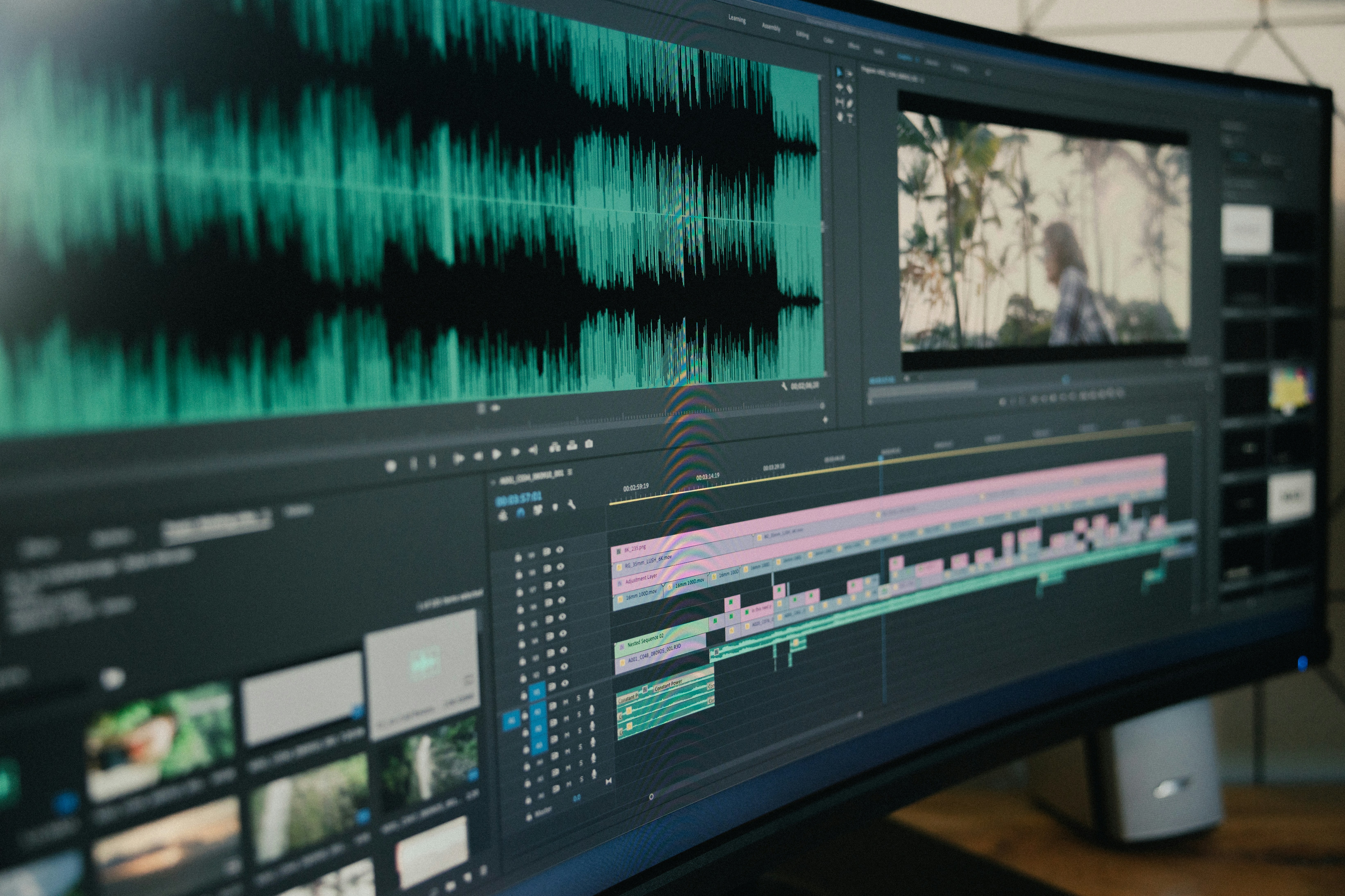 digital filmmaker working on color grading studio setup