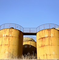 brown steel tank under blue sky during daytime