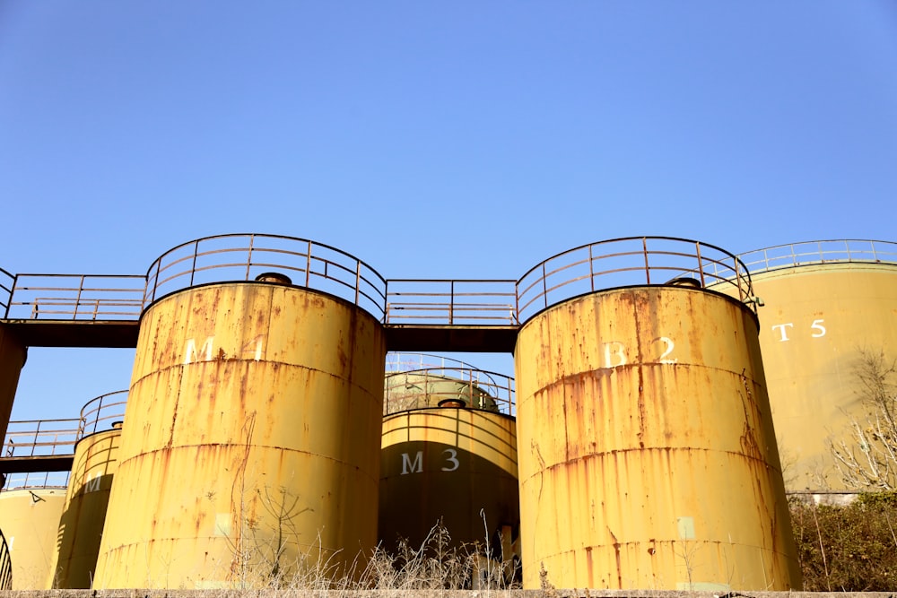 brown steel tank under blue sky during daytime