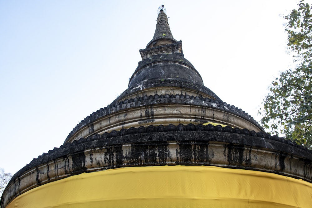 low angle photography of yellow concrete building