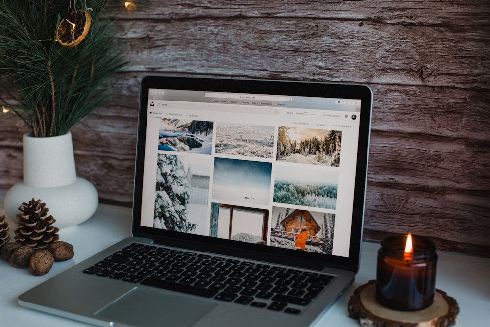 macbook pro on brown wooden table