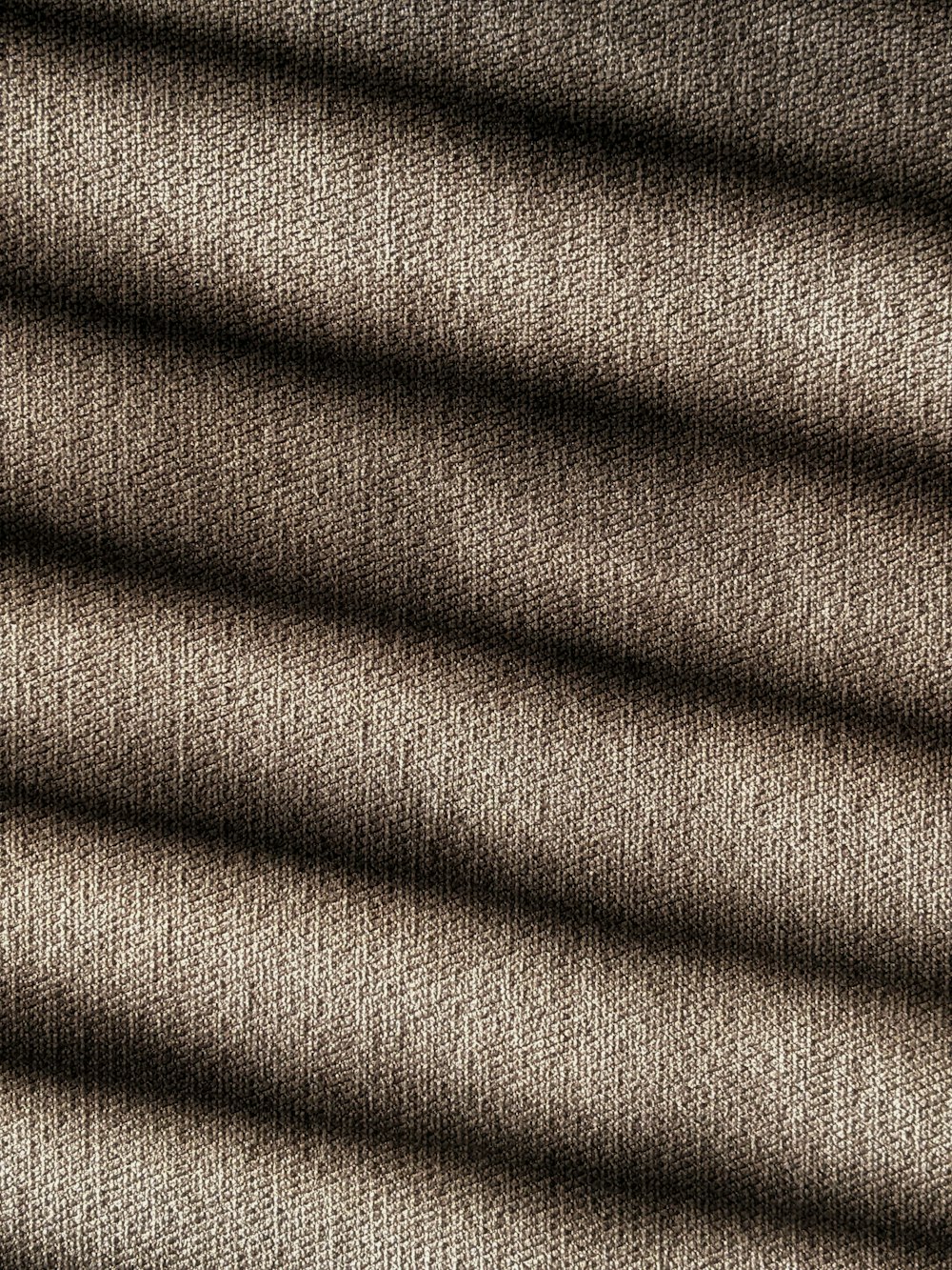 brown and black stripe textile