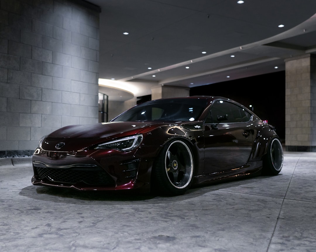 black porsche 911 parked in garage