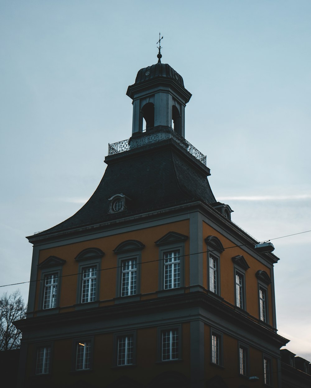 brown concrete building under white sky during daytime