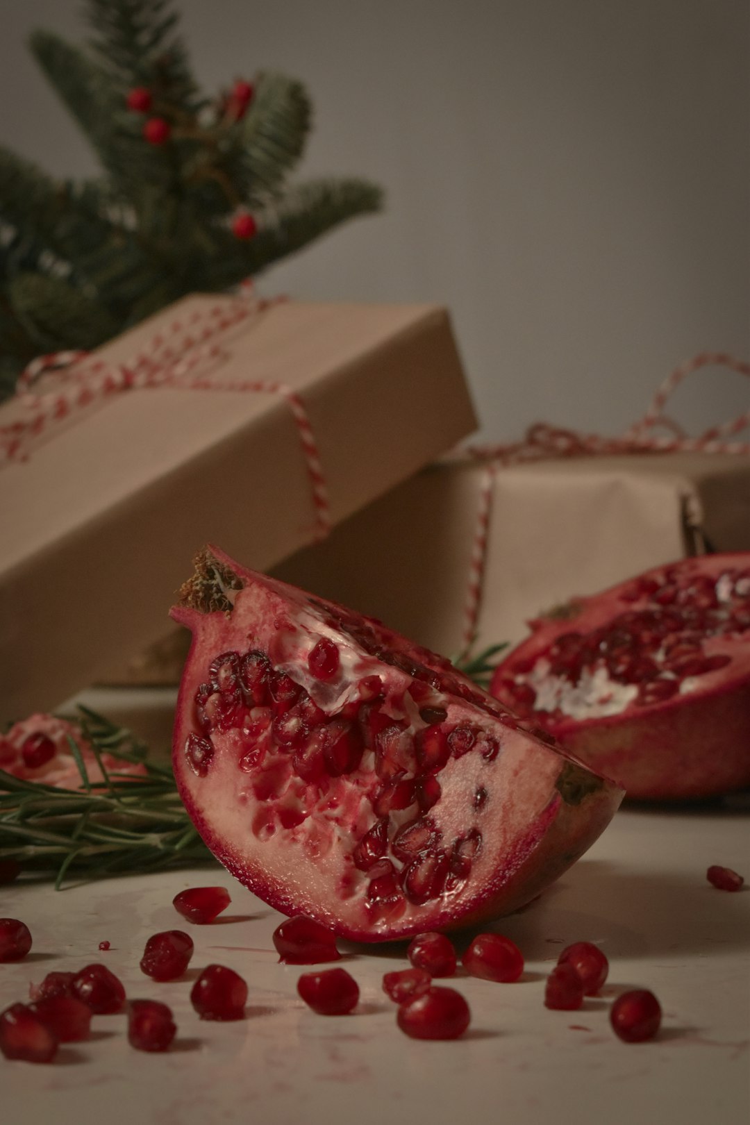 sliced pomegranate fruit on white box