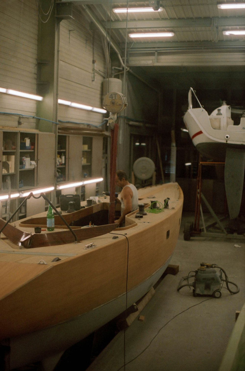 white and brown wooden boat