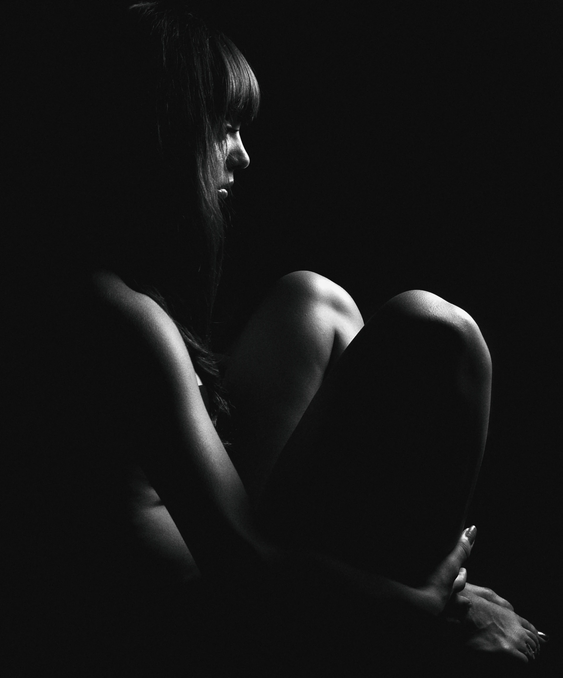 grayscale photo of woman in black dress