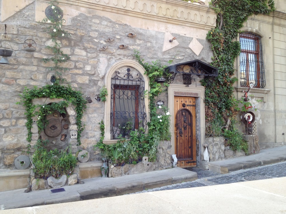 brown wooden door on gray concrete building