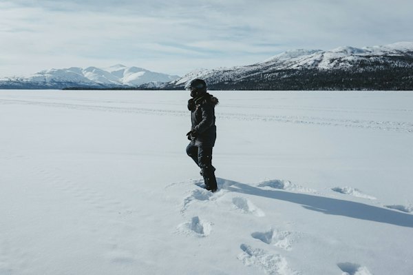 A walker on the snow in winter gear — Whitehorse, Canada