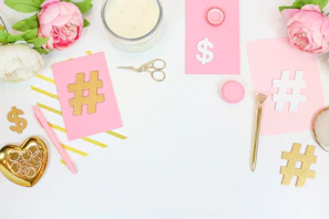 A vibrant flat lay of popular shopping items with price tags