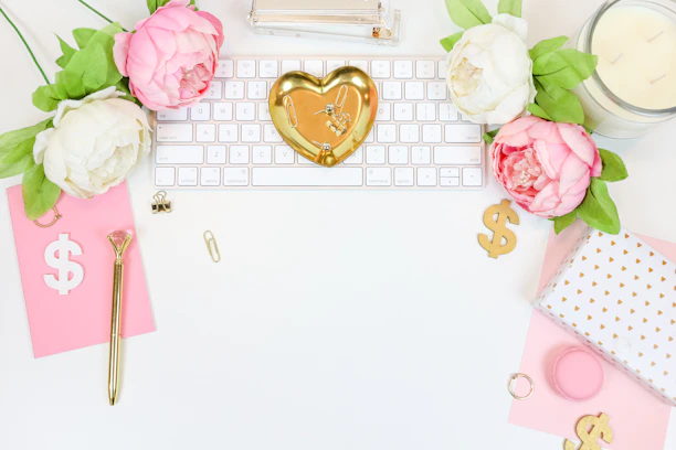An elegant workspace with soft blush pink and gold accents, symbolizing empowerment and calm.