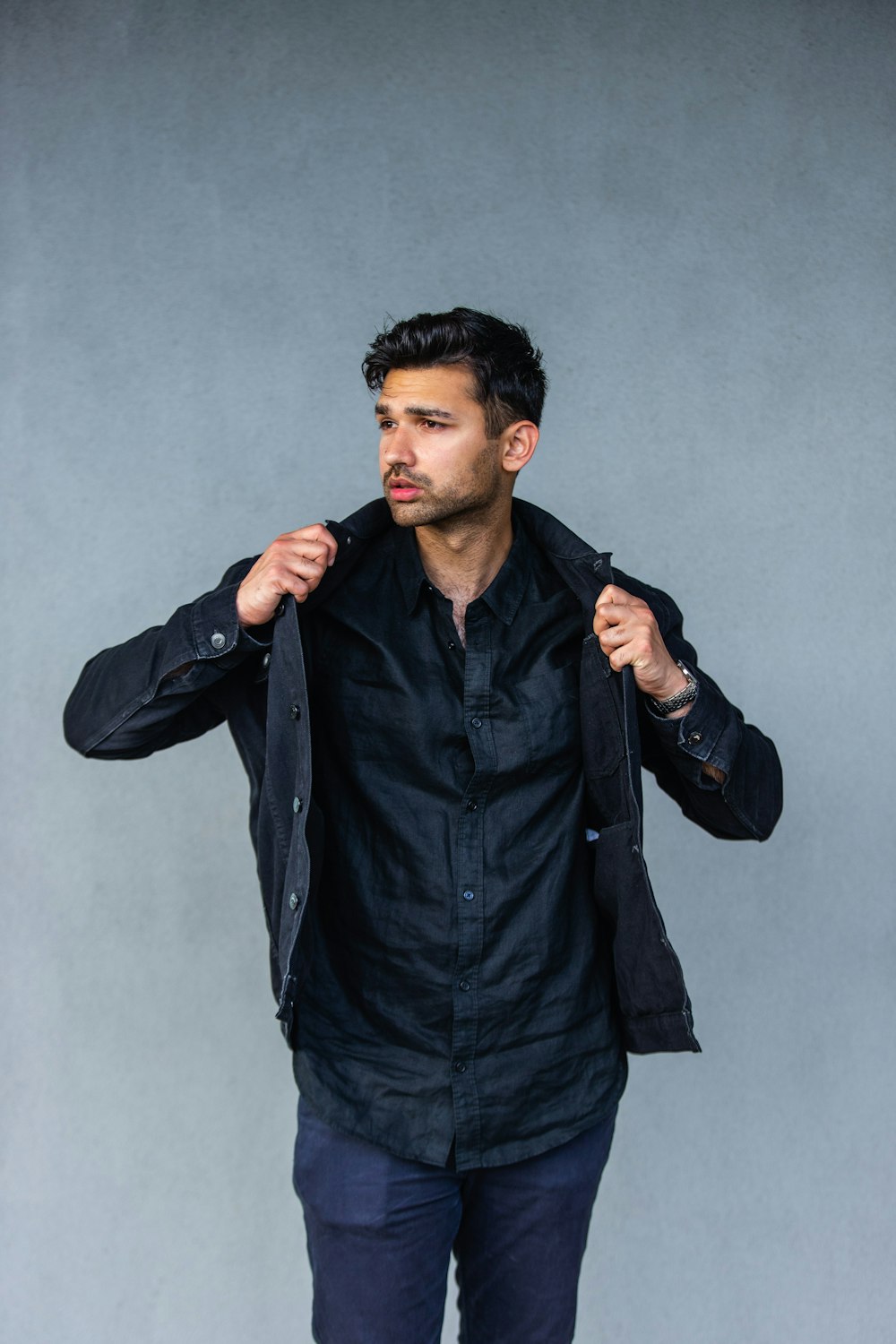 man in black leather jacket