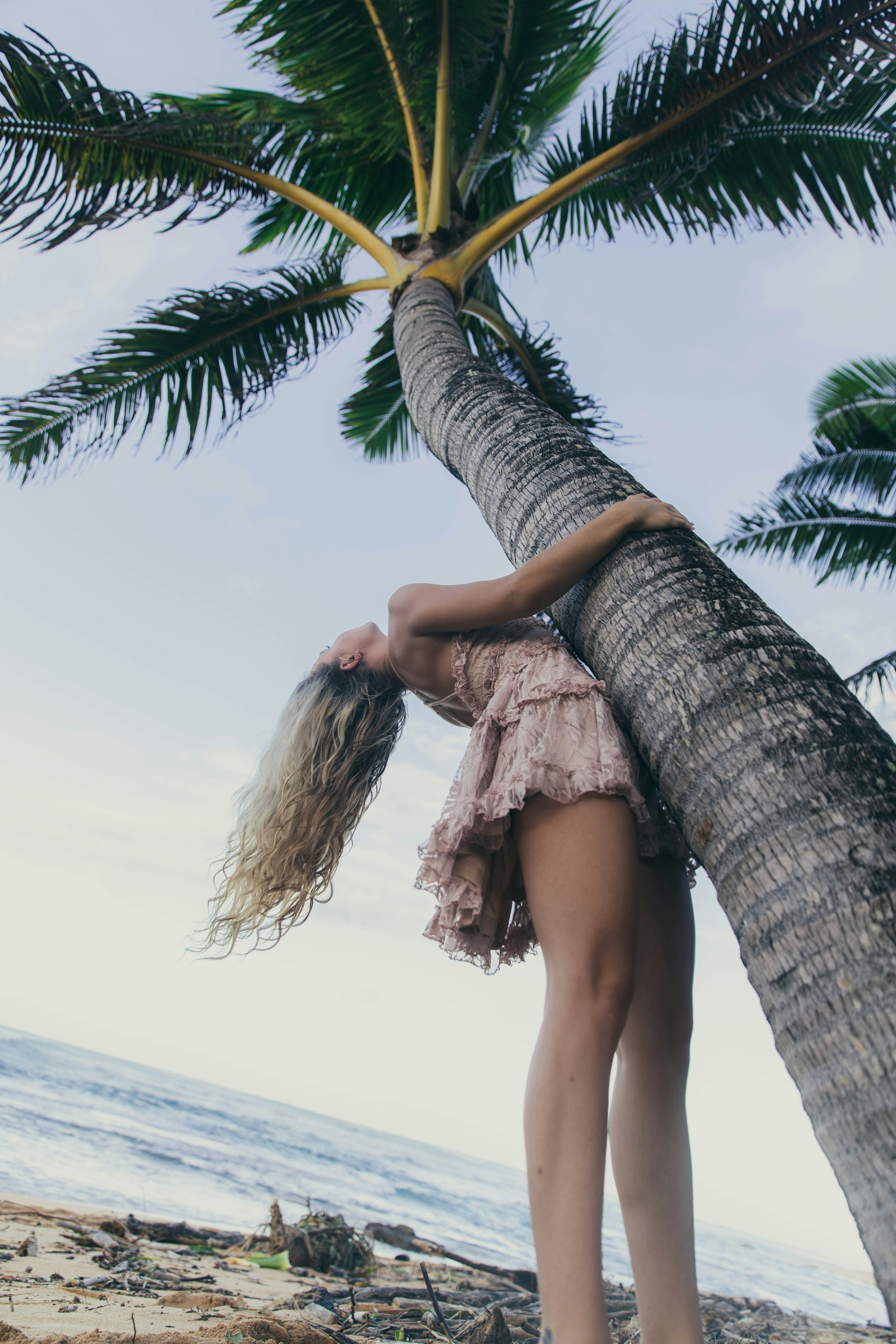 Woman in brown dress standing on beach during daytime photo – Free ...