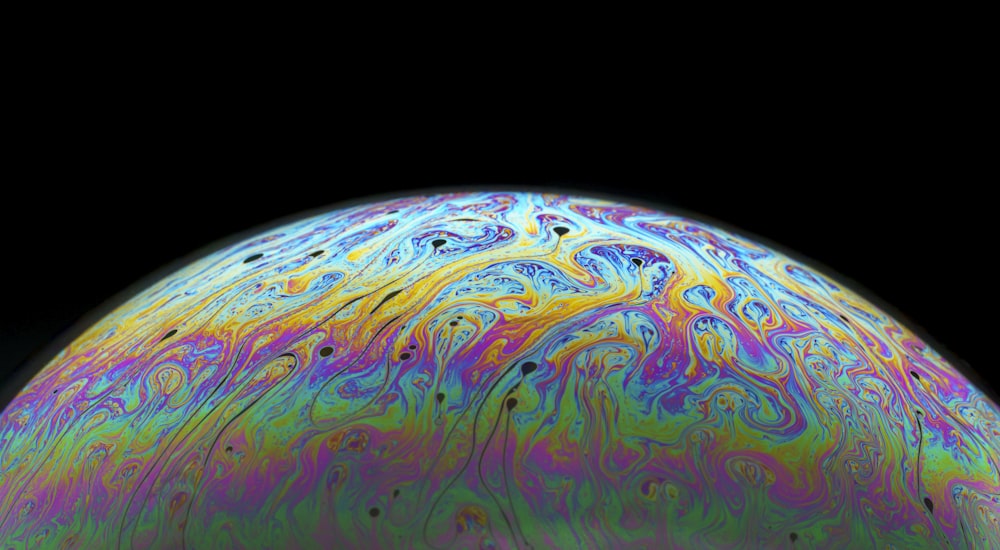 purple yellow and blue planet