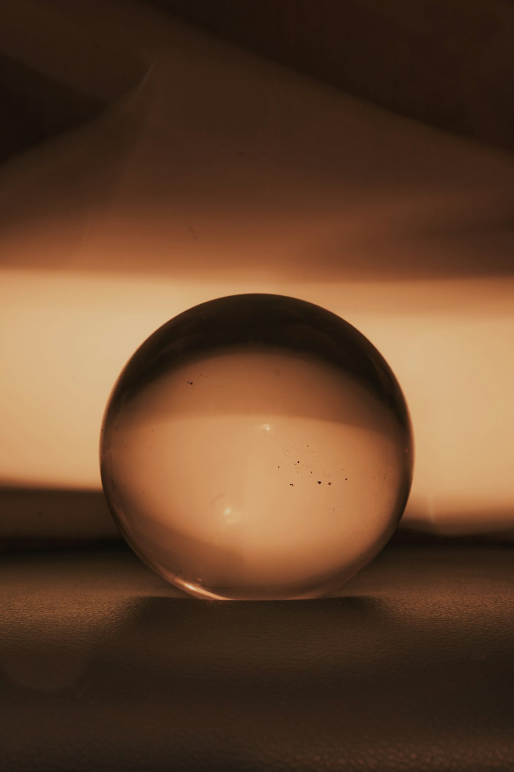 white round ornament on brown wooden table