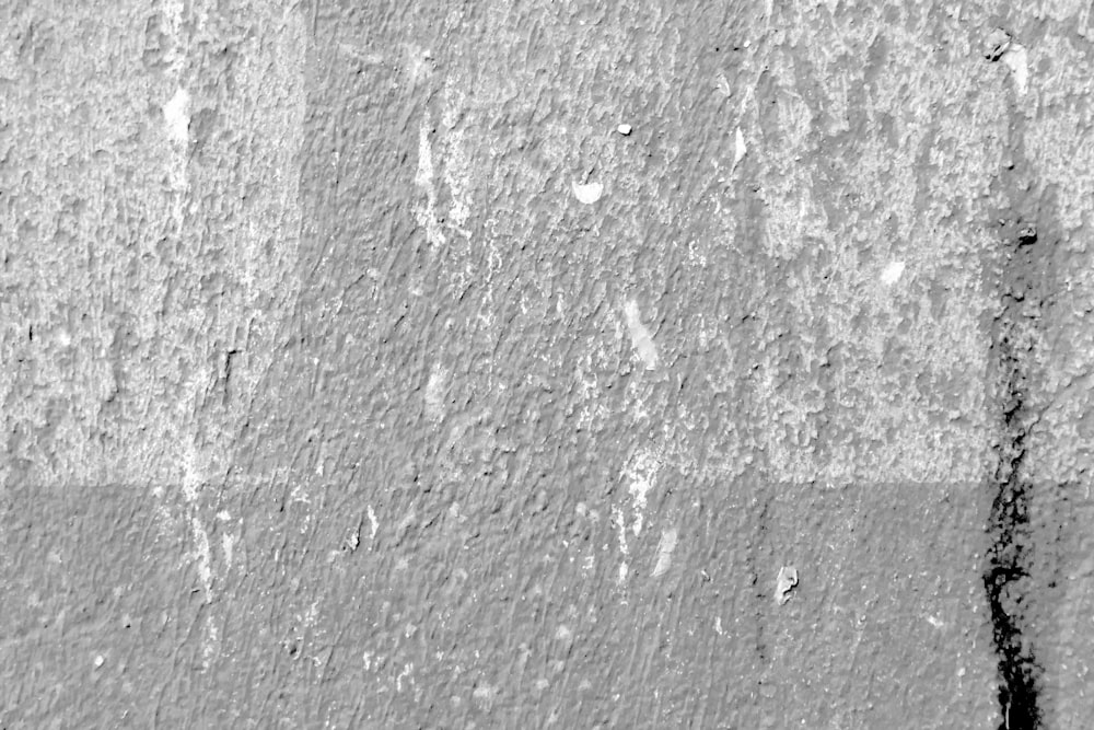 grayscale photo of concrete wall