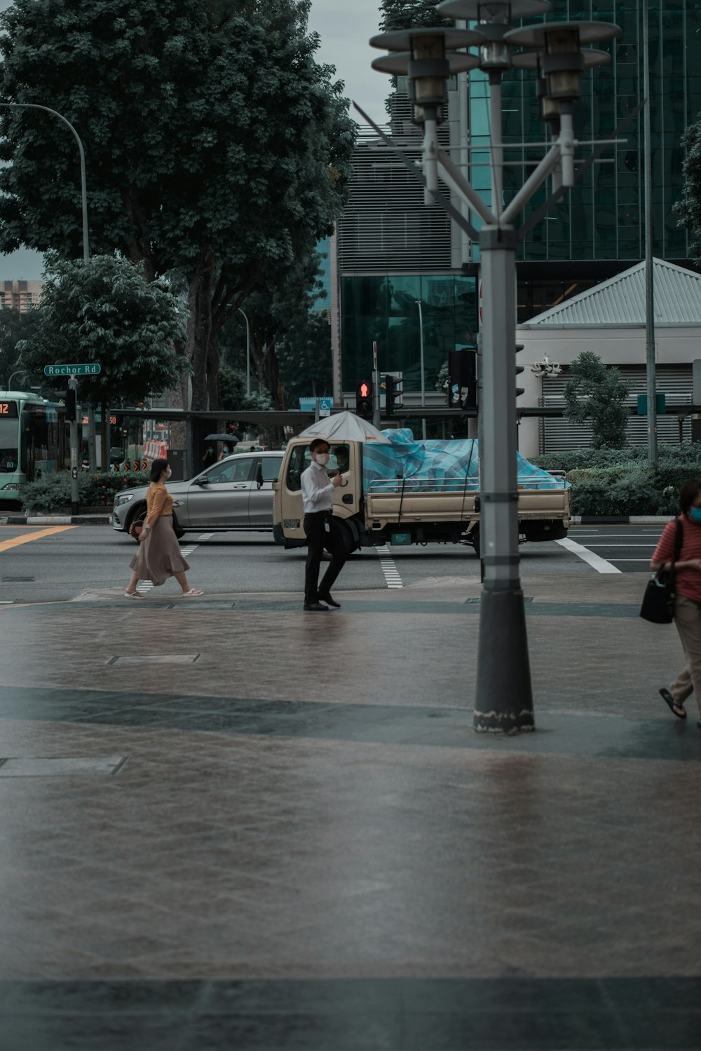 people walking on sidewalk during daytime