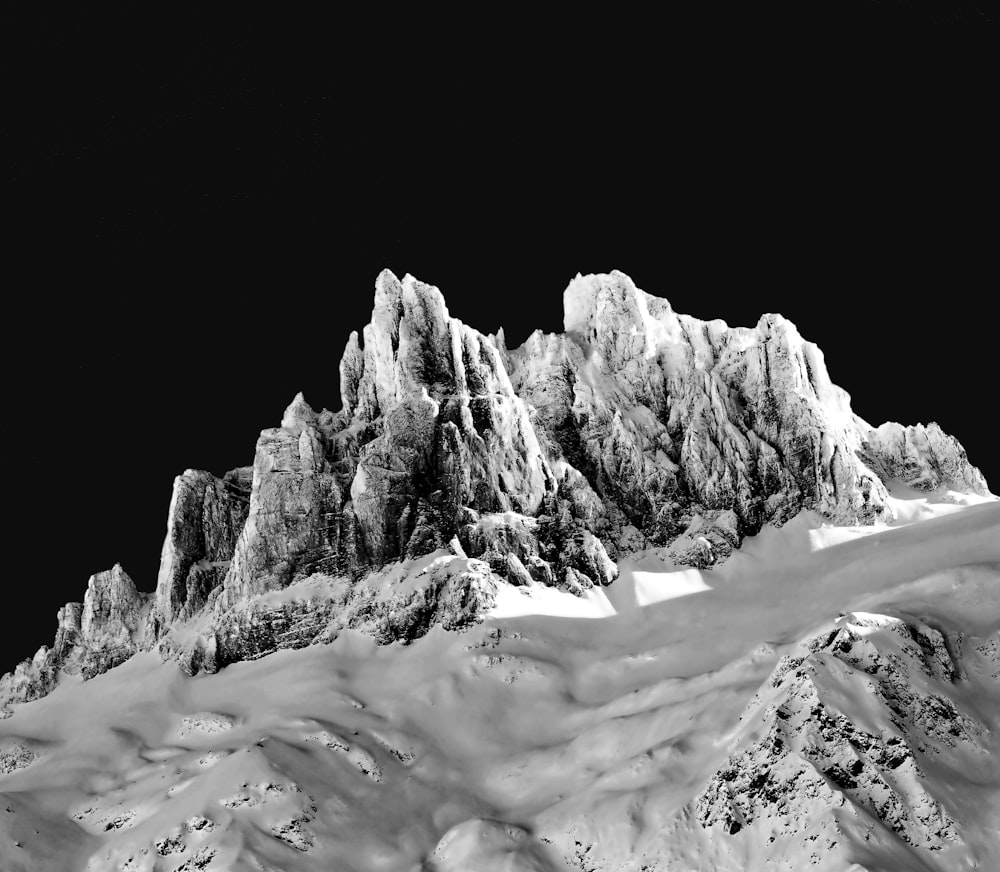 snow covered mountain during daytime