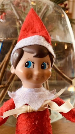 girl in red hat doll