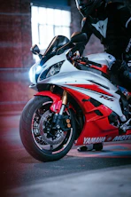 red and black honda sports bike