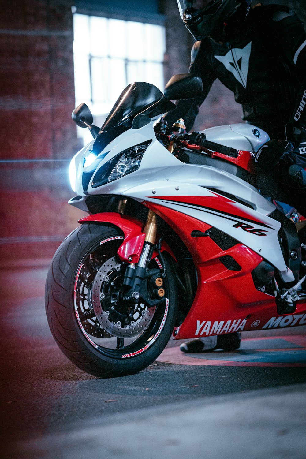 red and black honda sports bike