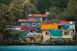 houses near body of water during daytime