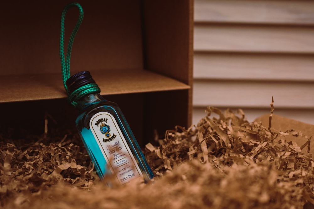 blue and white labeled bottle