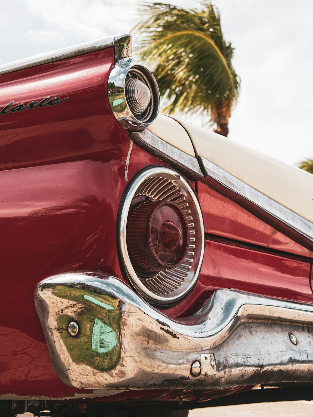 red car with chrome front door