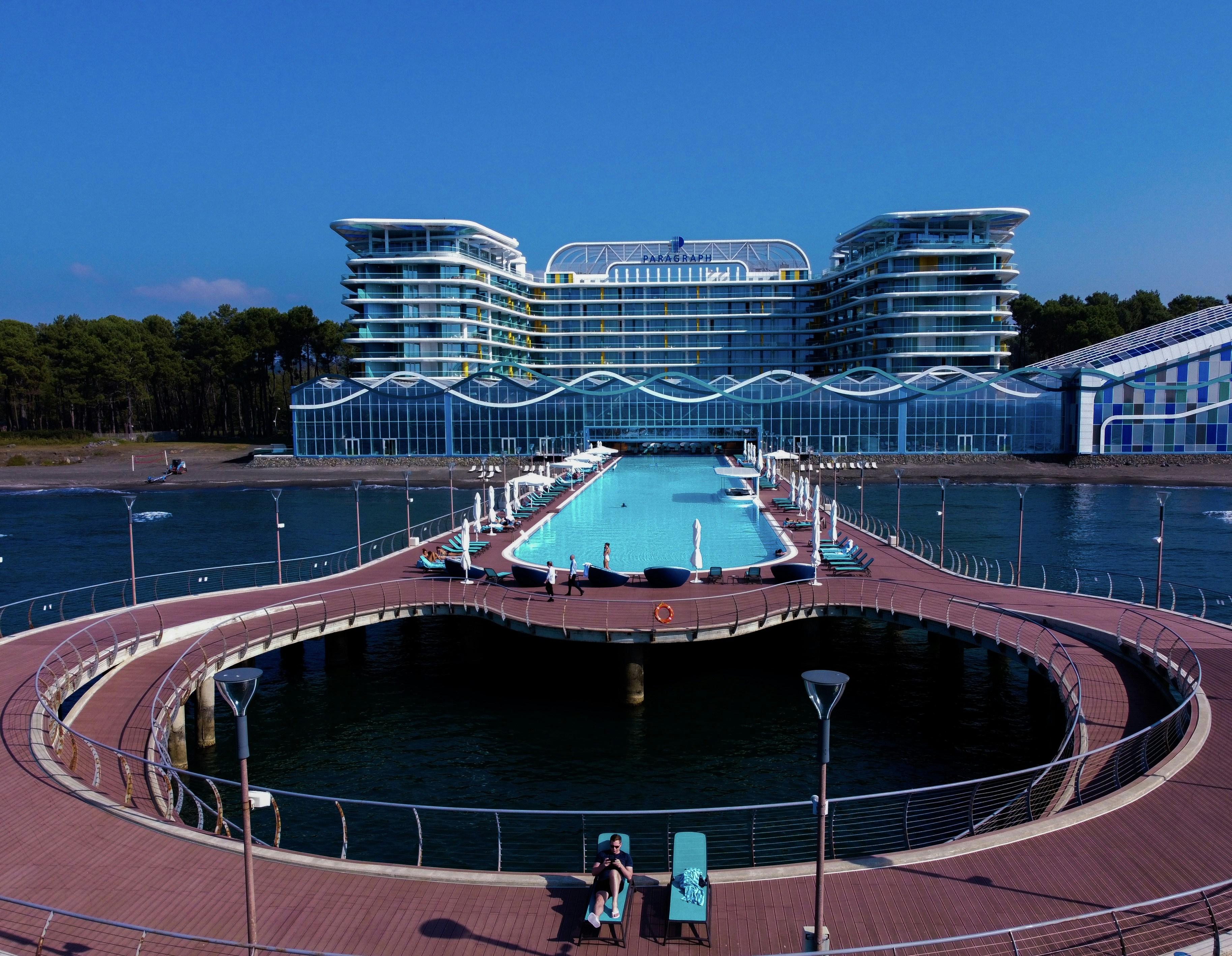 people walking on the bridge during daytime