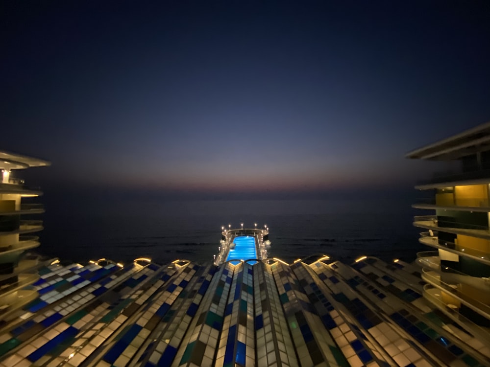 white and blue building during night time