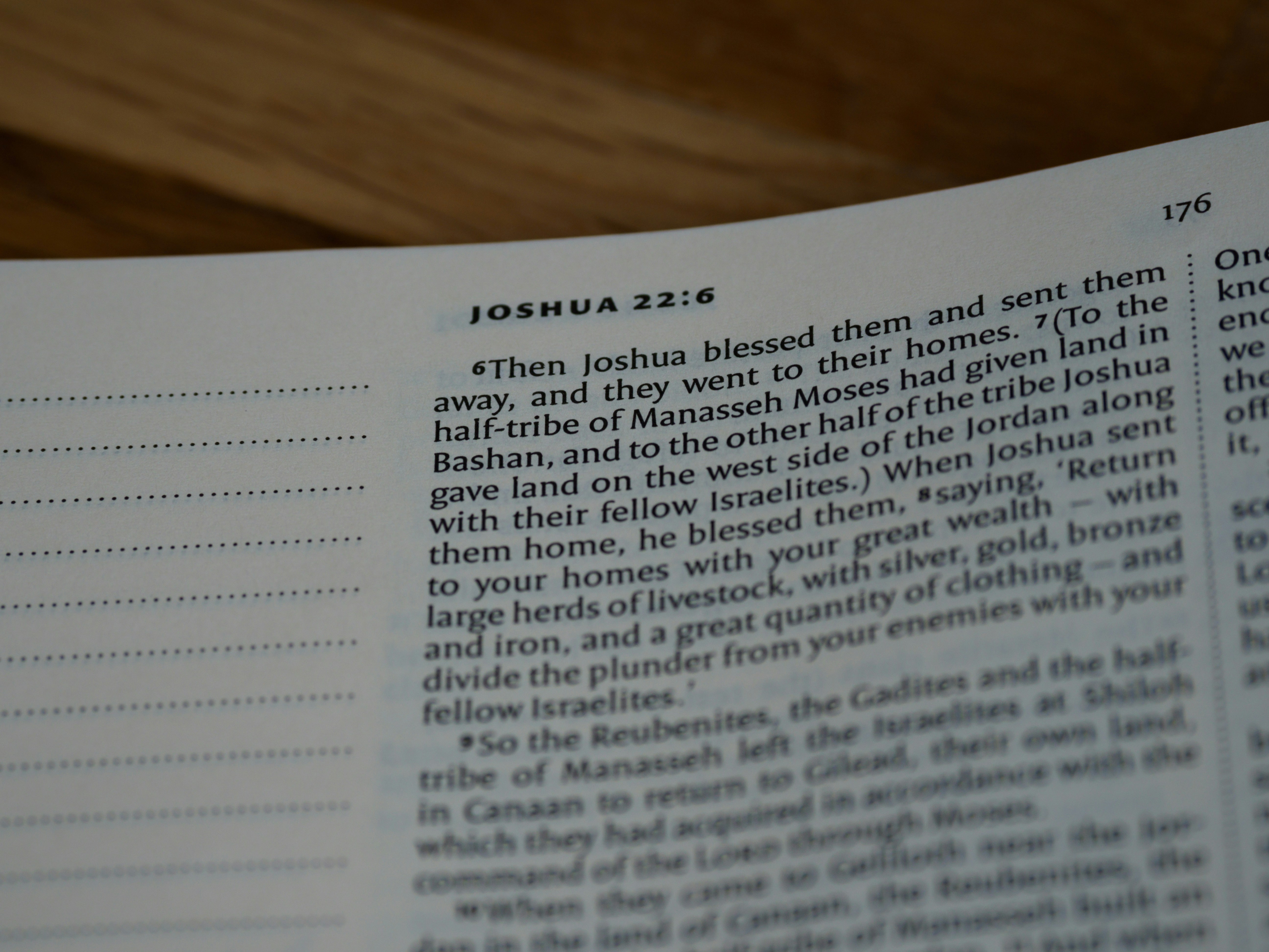 white printer paper on brown wooden table