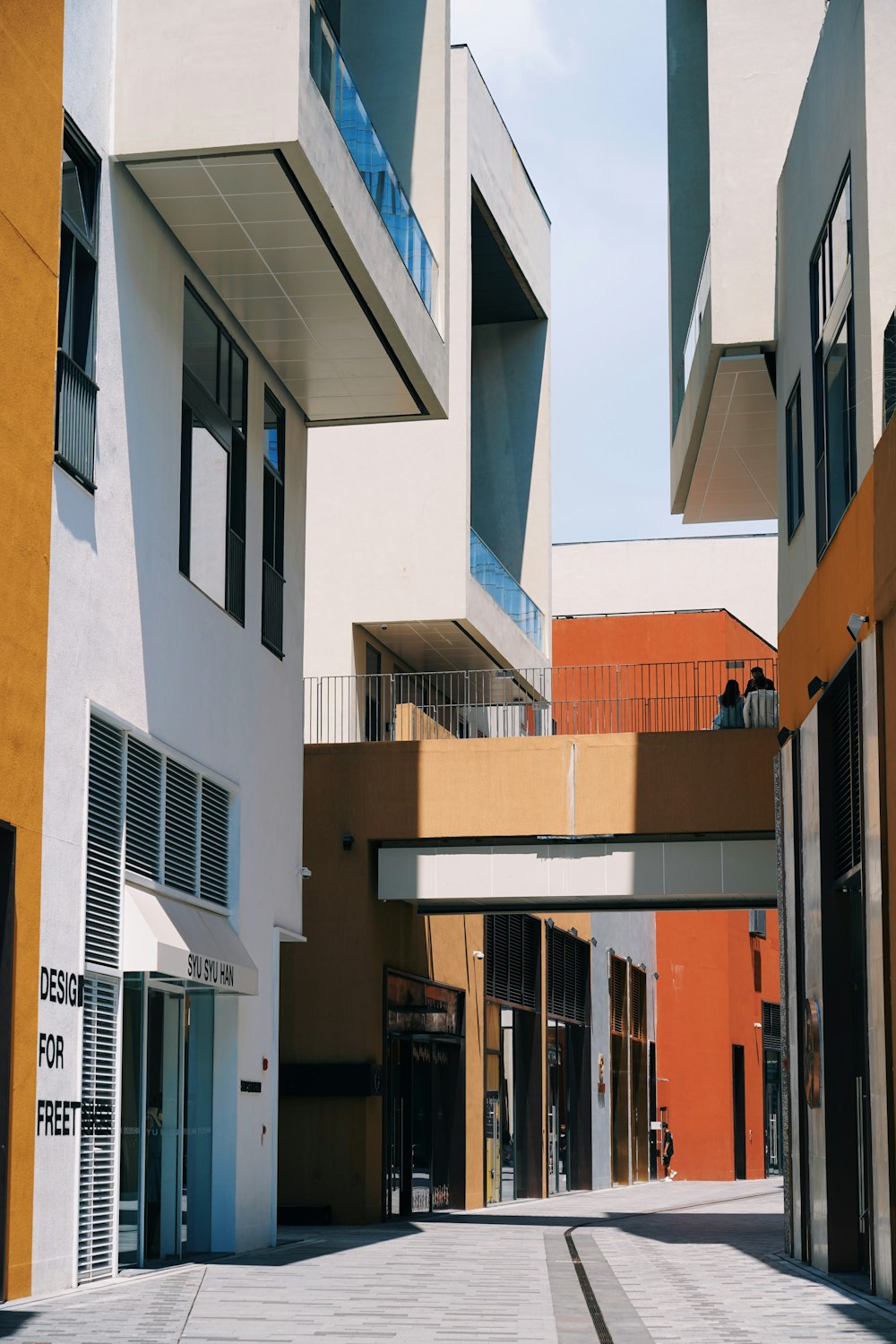 white and brown concrete building during daytime