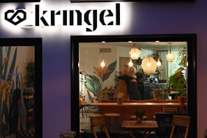 A cozy café scene where people share stories over coffee, embodying genuine connection.