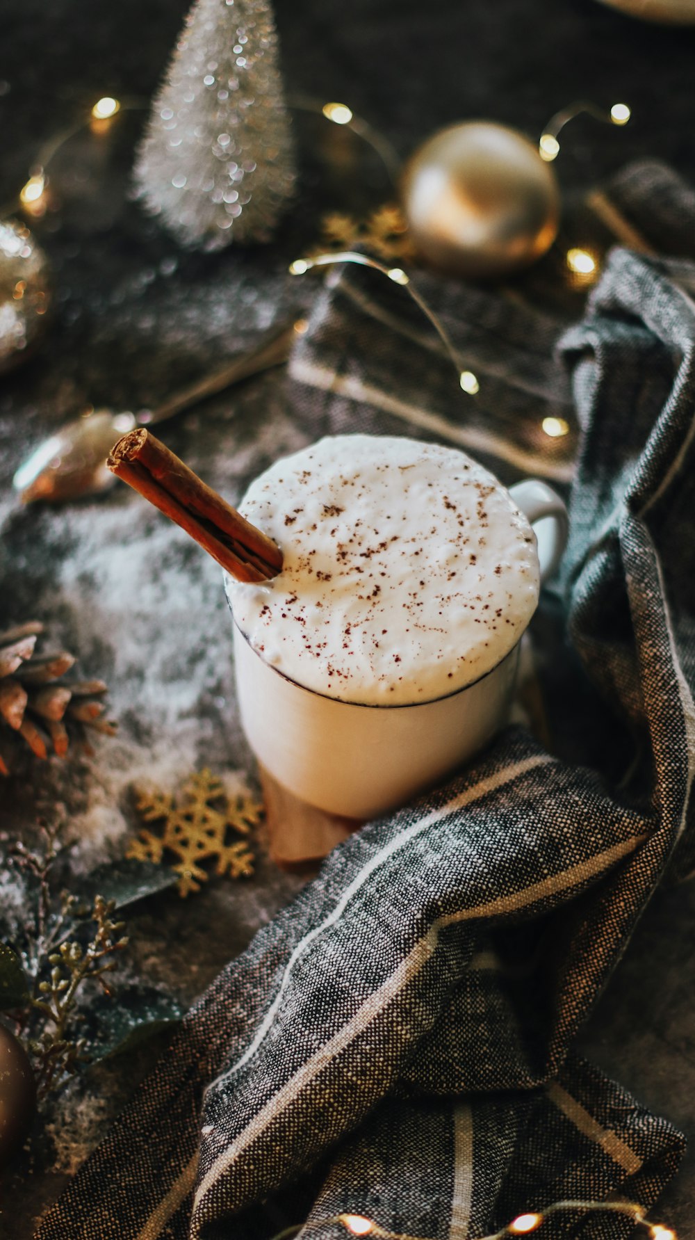 white liquid in clear glass cup