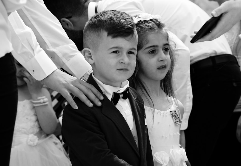 grayscale photo of man and woman smiling