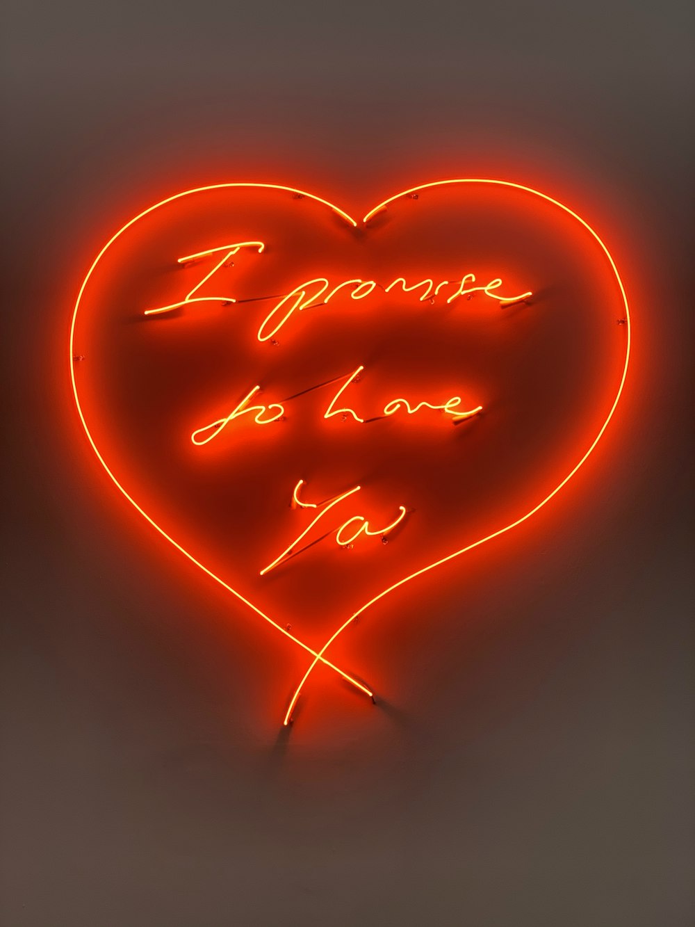 a neon sign that says i love you
