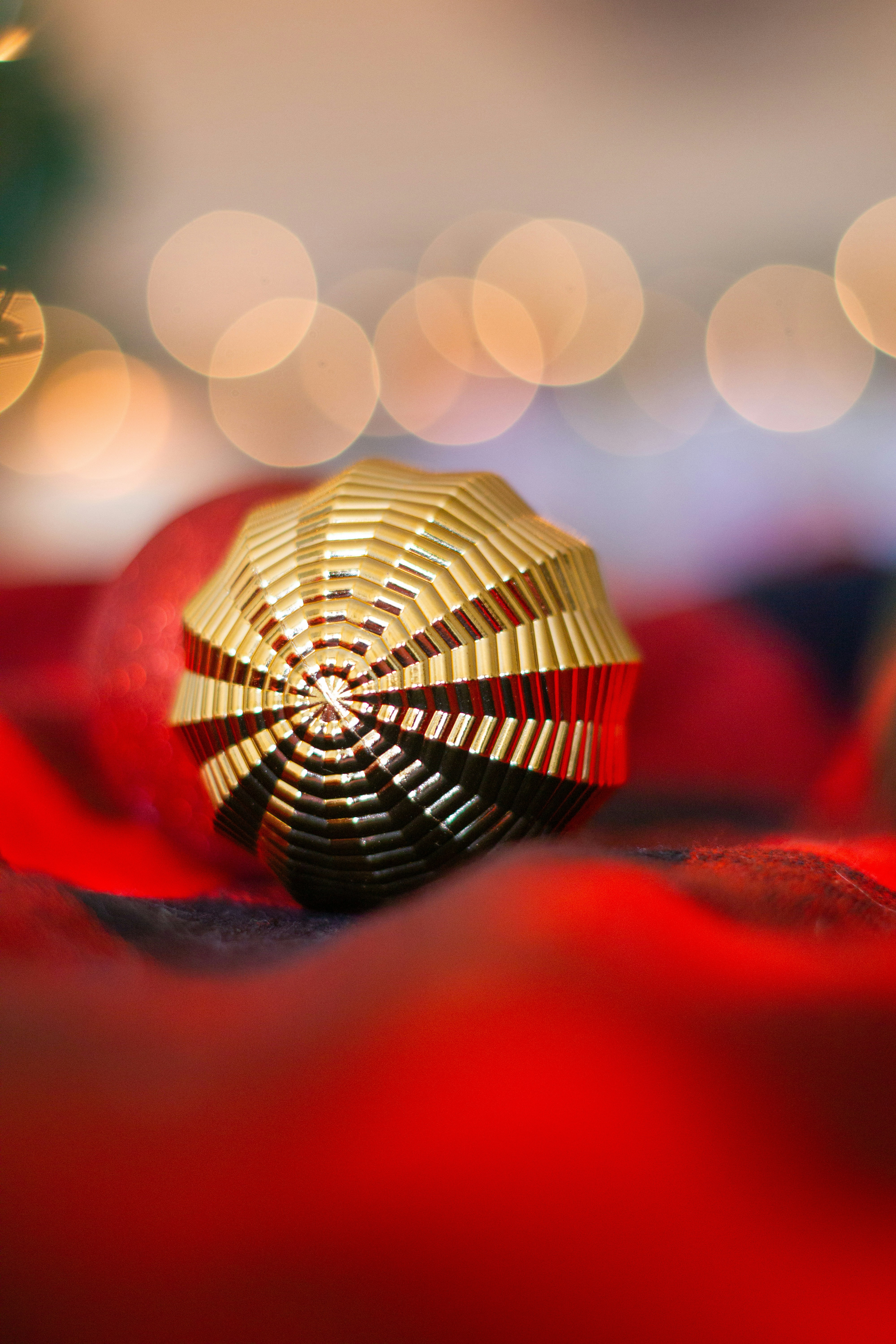 gold and red round ornament