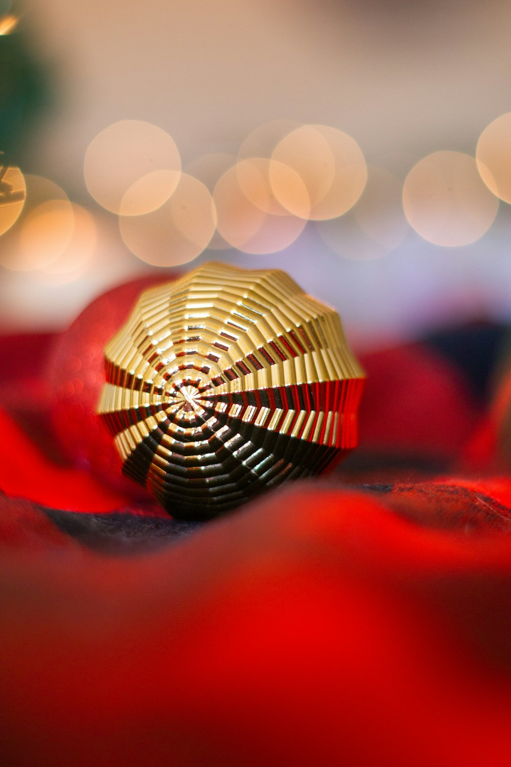 gold and red round ornament