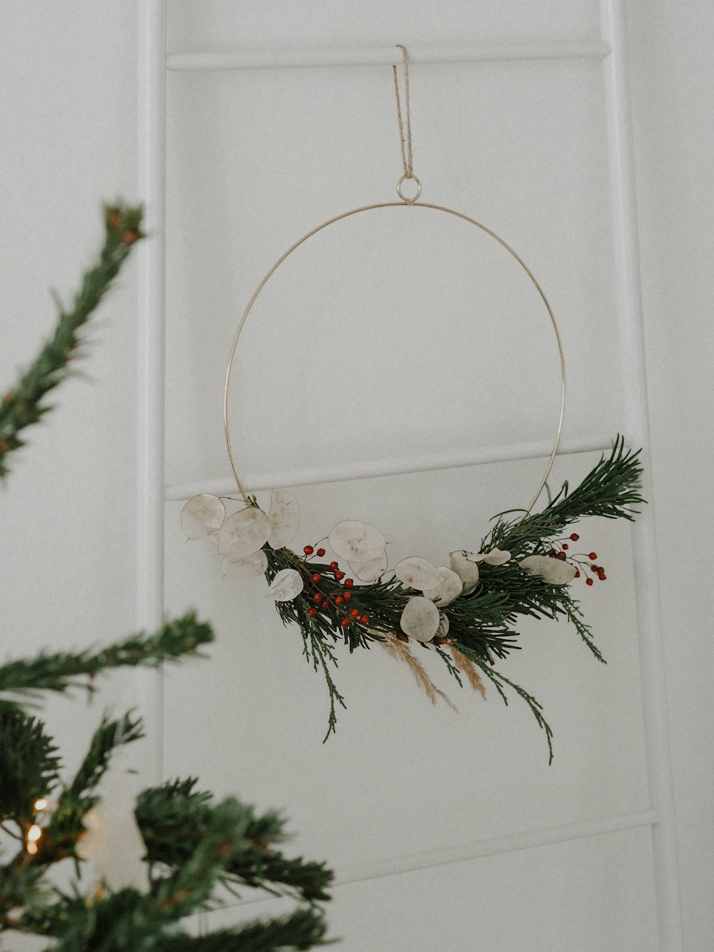 a christmas wreath hanging on a wall
